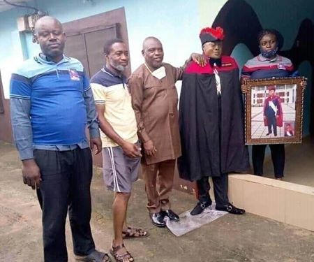 See The Shocking Moment Family Members Took Pictures With Standing Dead Man -PHOTOS Man -PHOTOS