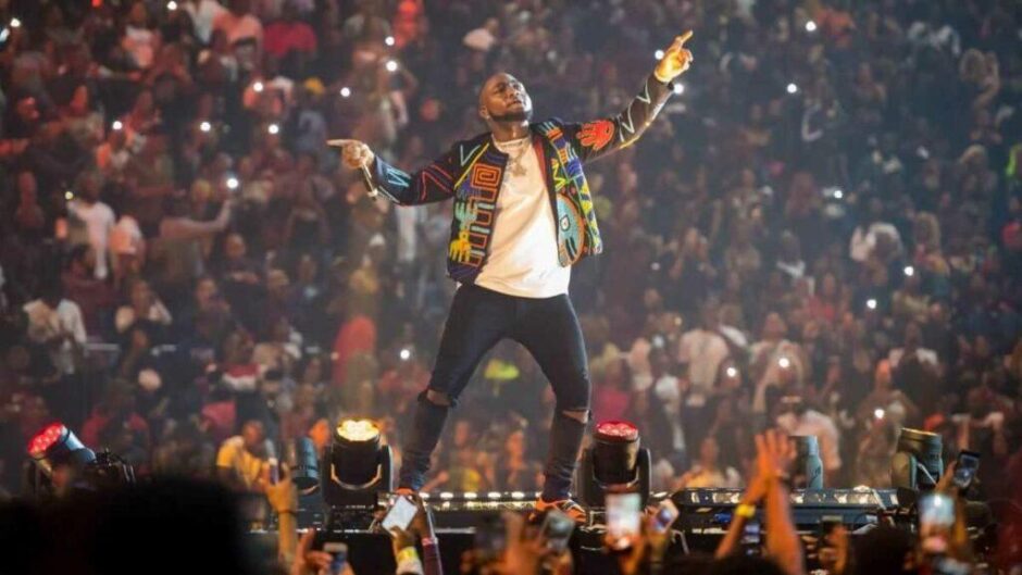 davido wows o2 arena with grand entry in lcd cage scaled