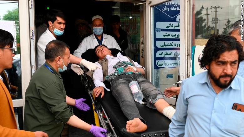 at least six dead as multiple explosions hit kabul schools