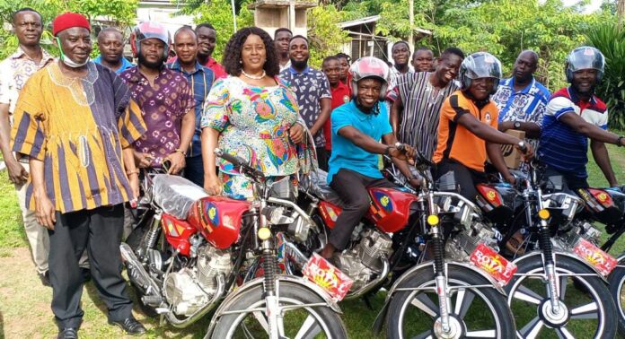 dce presents motorbikes and laptops to biakoye assembly members