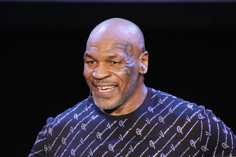 mike tyson all smiles greets fans in miami after punching man on plane scaled