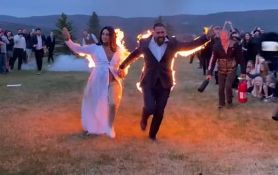 bride and groom set themselves on fire at their wedding