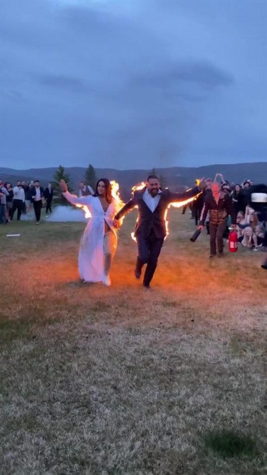 bride and groom set themselves on fire at their wedding scaled