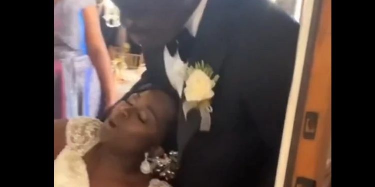 bride faints briefly as joe mettle pops up at her wedding reception