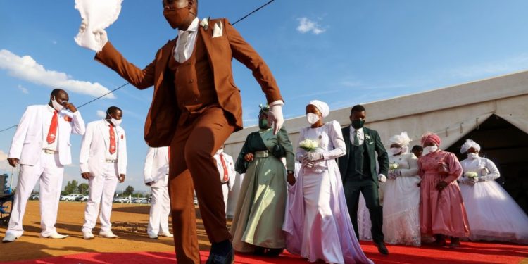 hundreds tie the knot in easter mass wedding in south africa