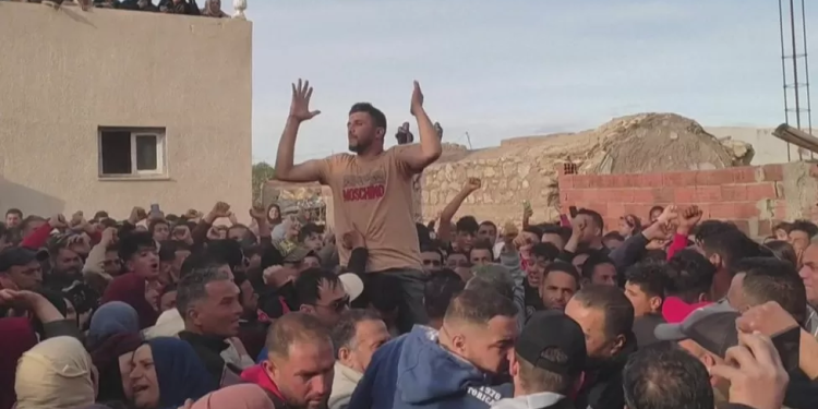 protests at funeral of tunisian footballer who set himself on fire