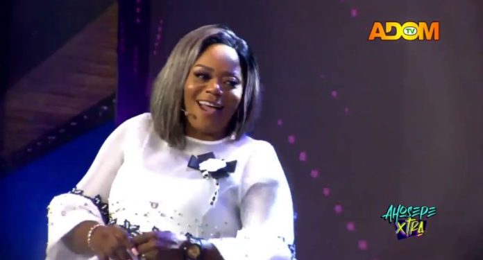 emotional moment between piesie esther and mother at adoms mothers day event