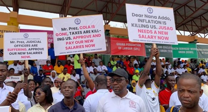 may day celebration salaries and conditions of service issues dominate