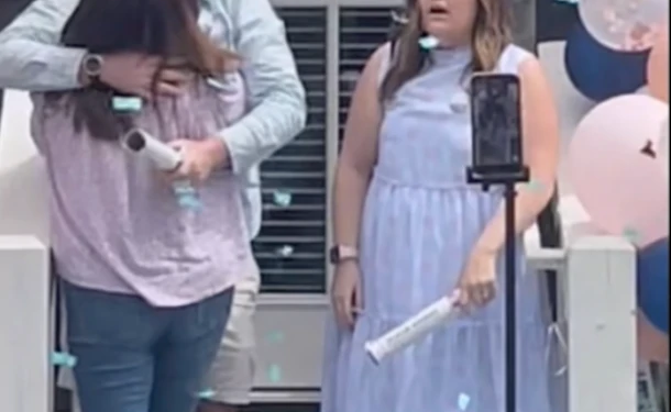 mother in law interrupts gender reveal to hug son before he can congratulate his pregnant wife