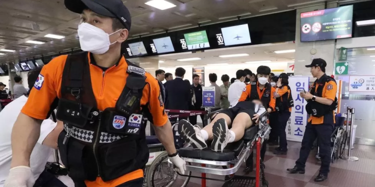 Passenger arrested for opening plane door during South Korea flight 1 passenger arrested for opening plane door during south korea flight