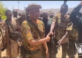 Sudan army chief appears in rare video armed with rifle
