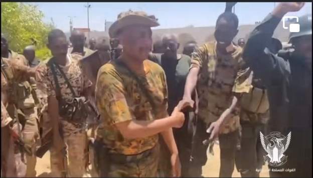 sudan army chief appears in rare video armed with rifle
