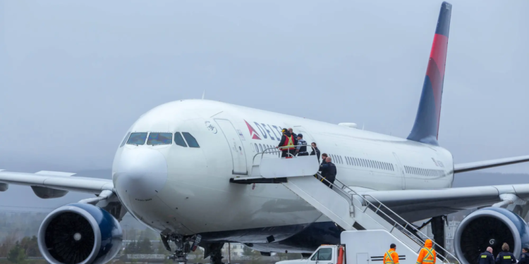 Delta flight diverted after unruly passenger breaks free from restraints 1 delta flight diverted after unruly passenger breaks free from restraints
