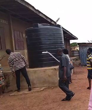 mcdan permanently fixes water challenge in ayalolo cluster of school