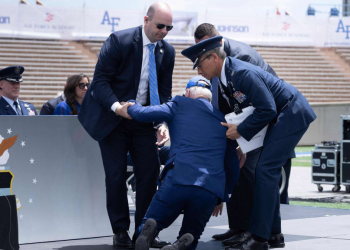 US President Joe Biden trips and falls at Colorado event