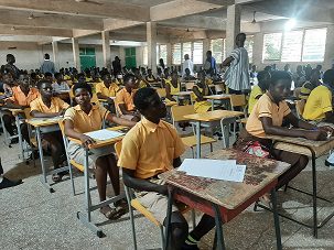 two nursing mothers pregnant student writing bece