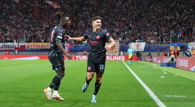 alvarez and jeremy doku combine to hand man city victory over leipzig