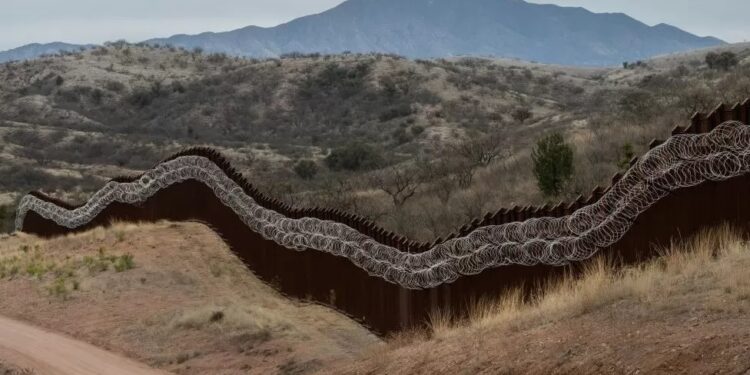 president biden attacked from both sides over new texas border wall