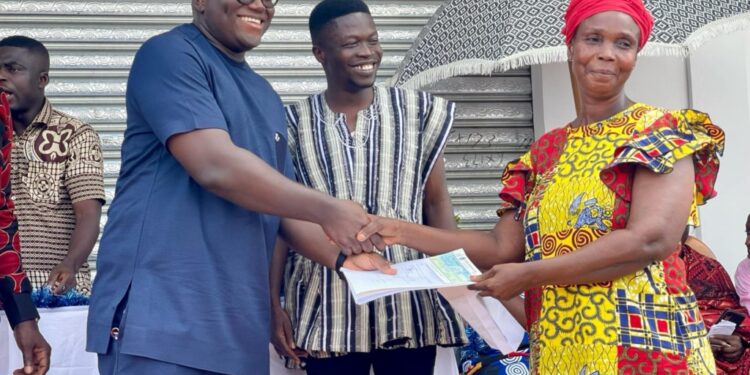ernest anim donates books and desks to schools in kumawu constituency