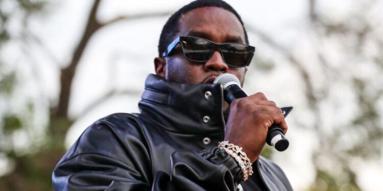 sean combs singer cassie accuses rap mogul of rape and abuse