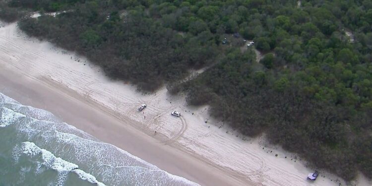 bribie island australian man dies after being buried in sand