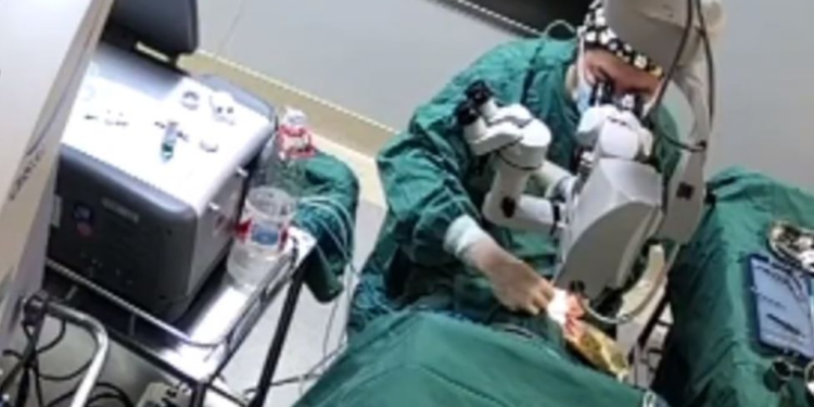 outrage over doctor punching patient during surgery in china