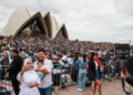 ‘We woke at 03:00 to get the best spot’ – tourists eagerly await iconic Sydney fireworks