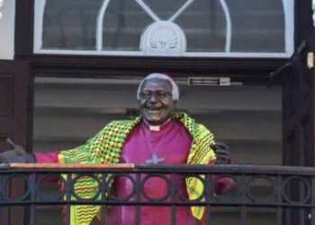 Archbishop Desmond Tutu statue wrapped in Palestinian scarf goes on display