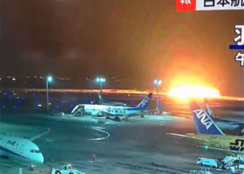 Japan Airlines plane in flames on the runway on Tokyo’s Haneda Airport