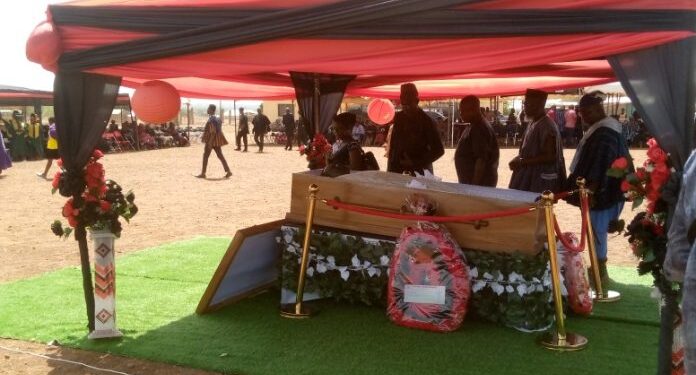 former information minister honored in hometown funeral