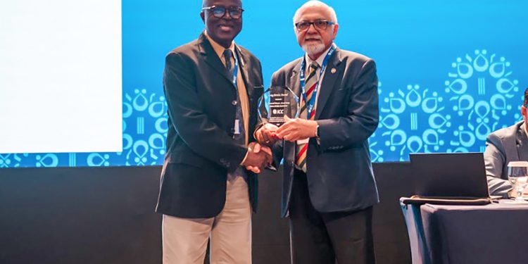 ghana cricket association president honored with long service award by icc