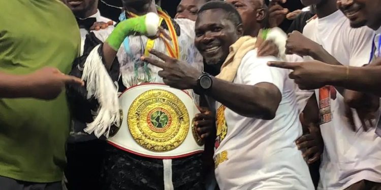 ebenezer adjei celebrates major victory with black panthers boxing gym fighters