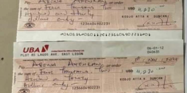 two identical twins defraud business woman of ghc2a2270000 with dud cheques