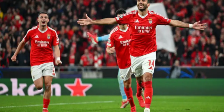 benfica hold off monaco in six goal thriller