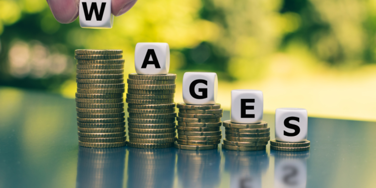 government urges tripartite committee to expedite wage negotiations