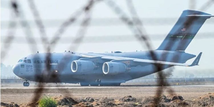 us military plane carrying deported indians lands in punjab