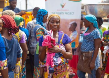 Xodus Communications Limited donates clothing to the needy at Madina Market