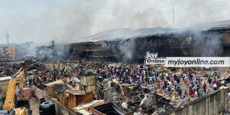 adum fire simmering fire and smoke visible in rubble a day after devastating inferno