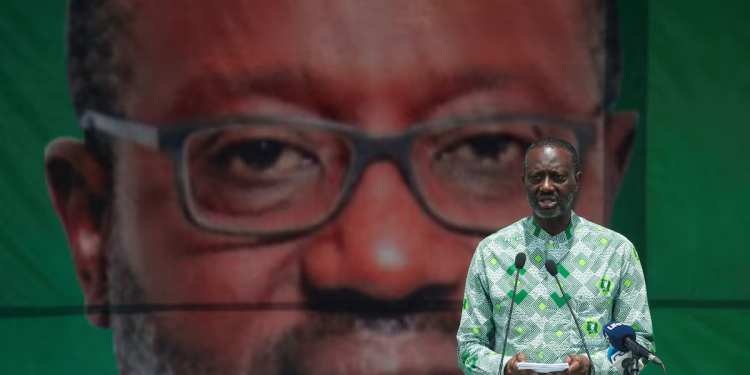 ex banker thiam drops french nationality in bid for ivory coast presidency