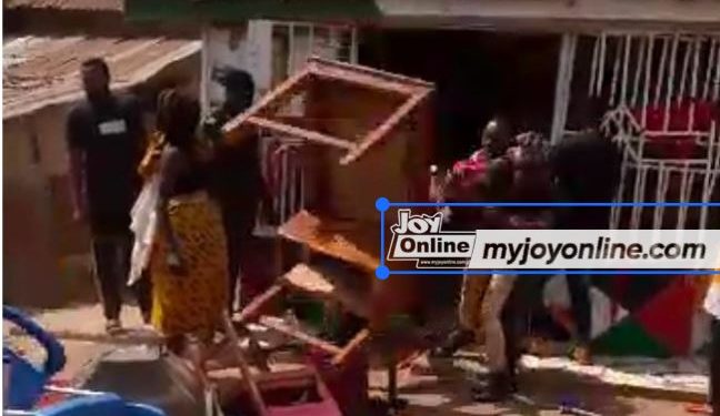 chaos in asante mampong as angry ndc supporters vandalise property set items ablaze