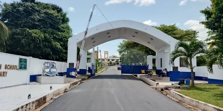 alumnus returns with a gift dr omane boamah transforms pope john shs roads
