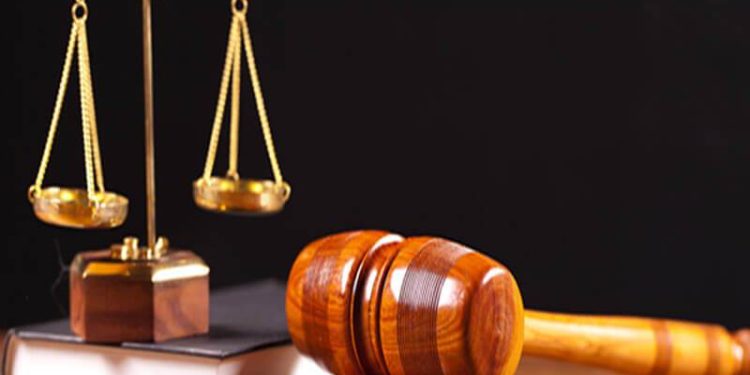 two arraigned for alleged illegal gold trade