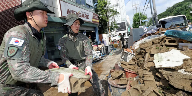 at least 14 dead in south korea floods and landslides