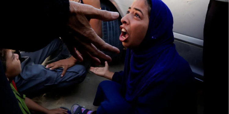 at least 20 killed in crush at us backed ghf aid site in gaza