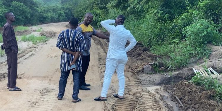 ekumfi mp leads road inspection to boost local development