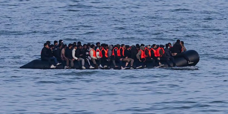 germany to tighten people smuggling law as chancellor visits uk
