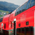 Man jumps on to moving high-speed train