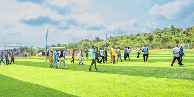 photos archbishop charles agyinasare hands over astroturf to perez university college