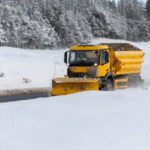 Snow and ice hit UK road and rail travel with schools forced to shut