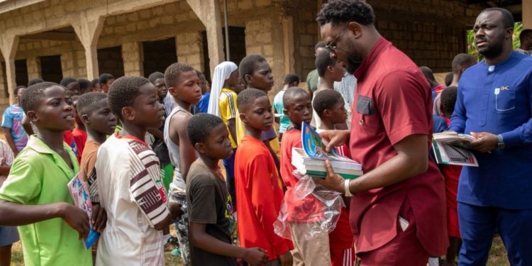 asante akyem south assembly distributes 300 shoes to deprived pupils